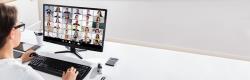 Woman at desk on laptop in Teams meeting